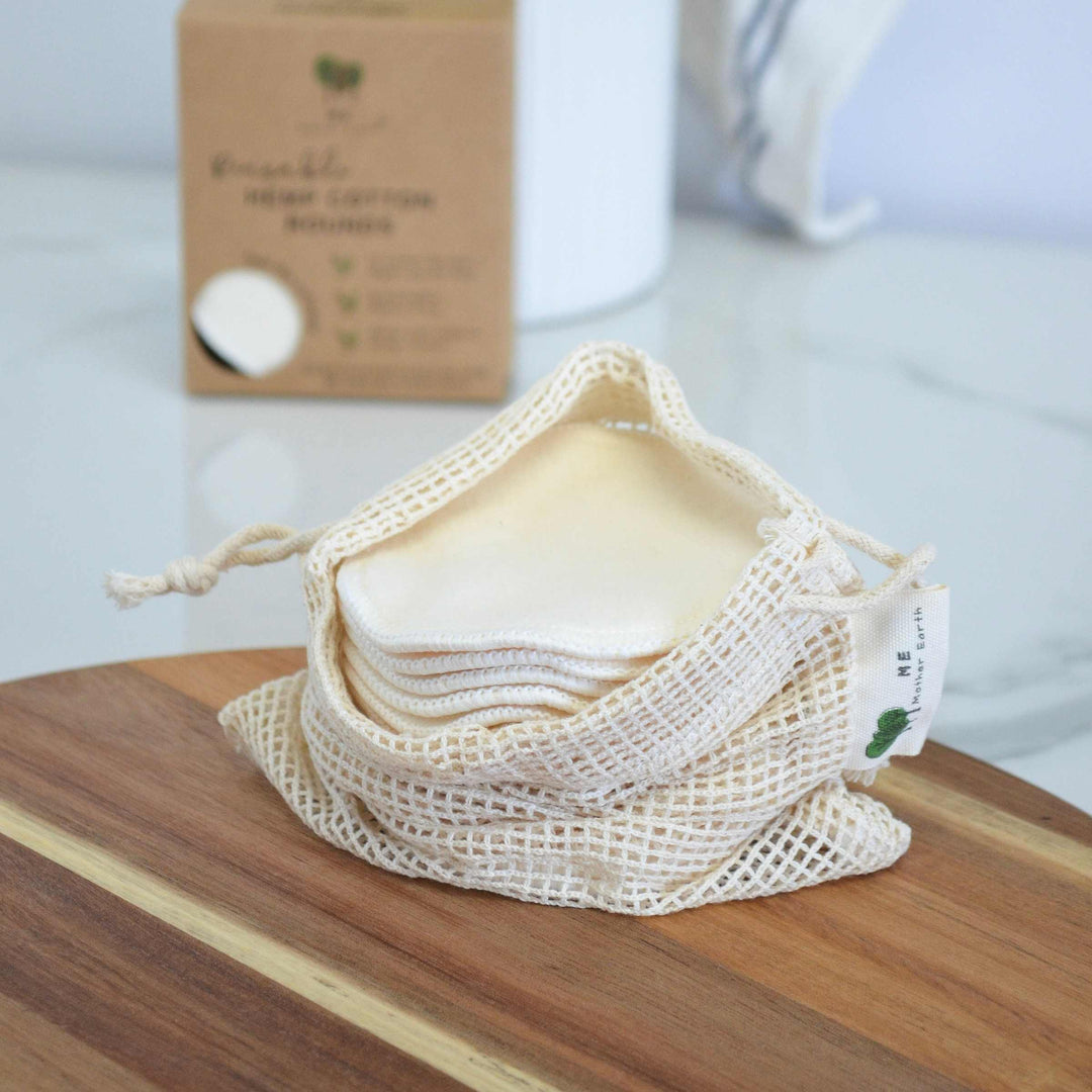 Set of 10 hemp cotton facial rounds with mesh cotton laundry bag.