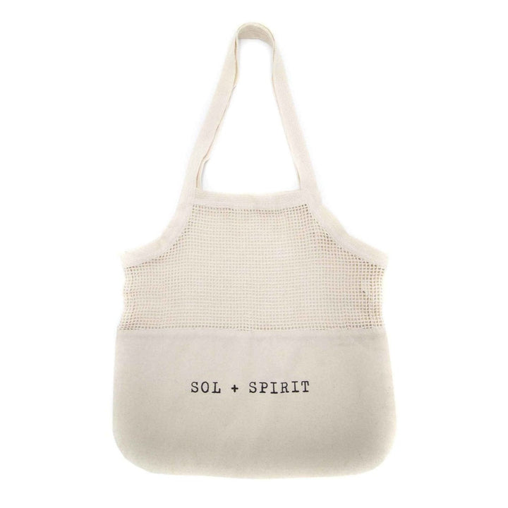 SOL + SPIRIT Organic Cotton Reusable Mesh And Canvas Sling Shopping Bag Laid Flat. Front Of Bag Showing Logo Print.