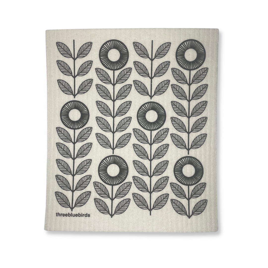 Three Bluebirds Swedish Dishcloth In Black Sunflower Design On White Background.