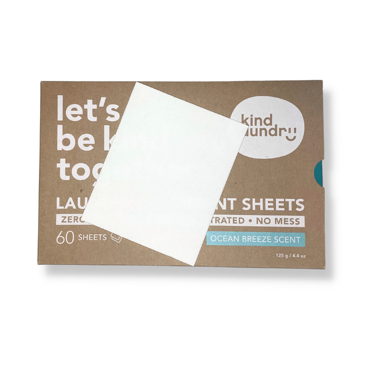 Eco friendly detergent sheet (Ocean Breeze Scent) atop plastic free packaging.